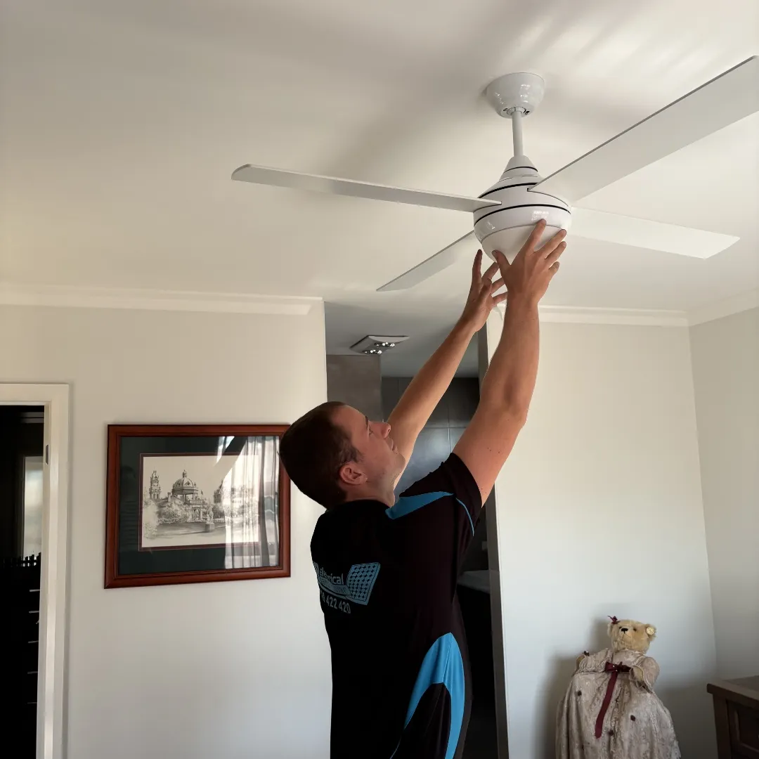 RB Solar & Electrical technician installing a ceiling fan in a Bendigo home